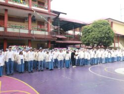 Rektor Unila Pimpin Peringatan Hari Guru 2024 di SMA YP Unila